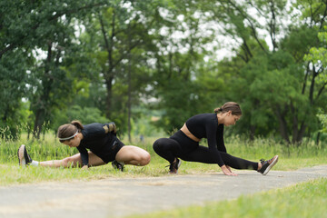 Girls stretching together