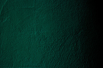Petrol colored wall background with textures of different shades of teal