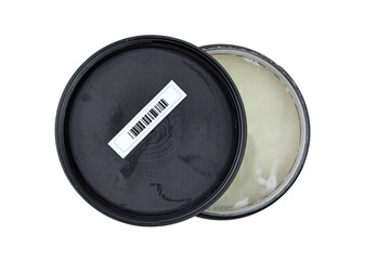 Plastic jar with lid top view. Sticker magnetic barcode on the inside of the cream jar. Plastic retail security soft tag label with random barcode