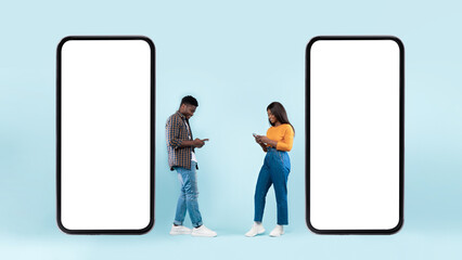 Couple showing blank empty smartphone screen for mock up