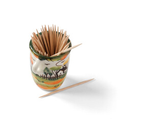 toothpicks in a ceramic box isolated on white background, lateral localization