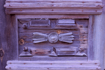 Wood texture in trendy color 2022 Very Peri. Color of 2022. Background for designers. New 2022 trending PANTONE 17-3938 Very Peri color. Old door.