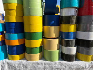 Colourful rolls of tape for sale at the flea market.