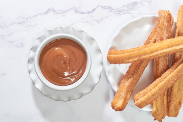 Homemade Spanish churros with sugar and cinnamon.