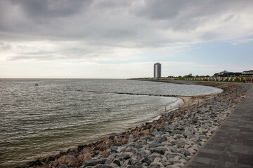 View from the beach of the city of Buesum on the North Sea with an interesting cloudy sky,Europe