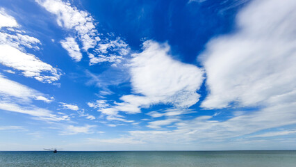 Scenic view of white cloud and clear blue sky in sunny day. Fluffy white cloud in the sky.