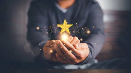 Businessman using hands to show the five-star symbol for highest satisfaction, 5-star feedback,...