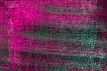 creative background, a spot of  colored primer rubbed on the surface of a linen canvas, temporary object, close, toning