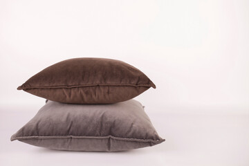 two velvet pillows on a white background. horizontal