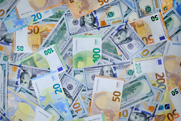 Money. Euro and us dollars banknotes. Background of dollars and european currency