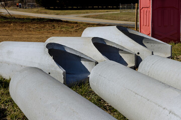 Large new concrete circular pipes lying down for the construction of sewerage system