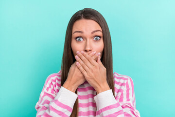 Portrait of attractive cheerful funny girly girl closing mouth no voice mute isolated over bright...