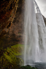 Fototapeta na wymiar Under the waterfall