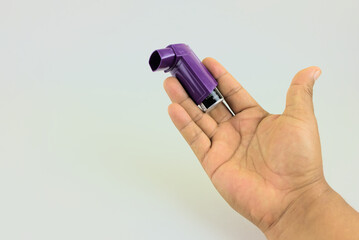 inhaler for people with asthma. medicine for bronchial tubes. - obrazy, fototapety, plakaty