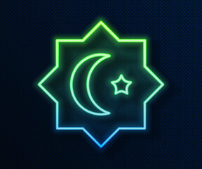 Glowing neon line Islamic octagonal star ornament icon isolated on blue background. Vector