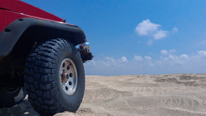 Fototapeta na wymiar Off road car and desert sand