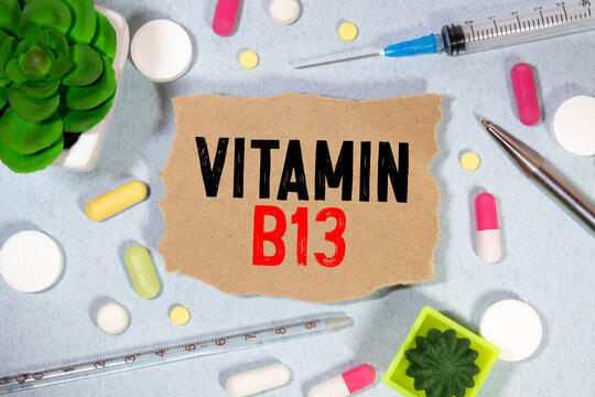 text VITAMIN B13 on torn paper, medical concept