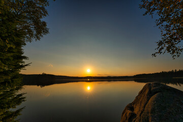 a beautiful sunset atmosphere on the lake in sweden