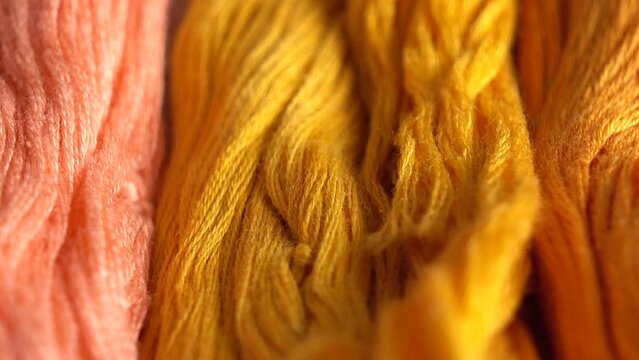 A top view of colorful mouline threads isolated on a white background.