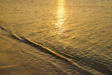 Waves on the tropical sandy beach of the red sea.