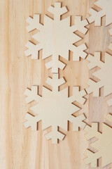 wooden christmas background with snowflakes