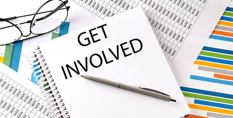 Notebook with text GET INVOLVED . Diagram and white background,Business