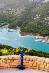 Urban telescope to observe the landscape in the Guadalest reservoir (Alicante, Spain)
