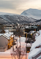 View of the city of Tromso (Norway) with the Tromsdalen Church (Arctic Cathedral) in the background