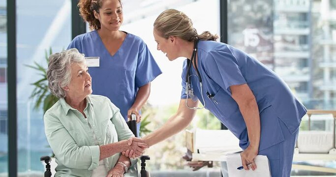 Lets get you admitted. 4k video footage of a doctor explaining medical test result to a senior patient sitting in a wheelchair in a hospital.