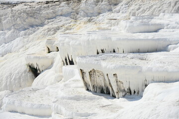 Natural travertine pools and terraces in Pamukkale. cotton castle in southwestern Turkey