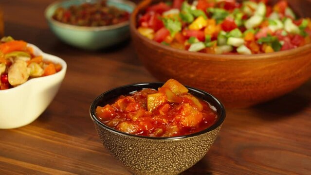 Moroccan cuisine. Traditional dishes, vegetable salad. Middle eastern culture. Homemade food. Bowls with sauces and cold appetizer.