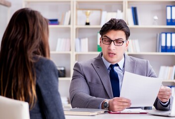 Business meeting between businessman and businesswoman