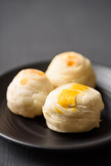 Thai mooncake or Chinese pastry on black background