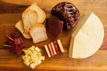 Dessert and snack of Sweet, romeo and juliet, Cheese with guava on wooden board and black background