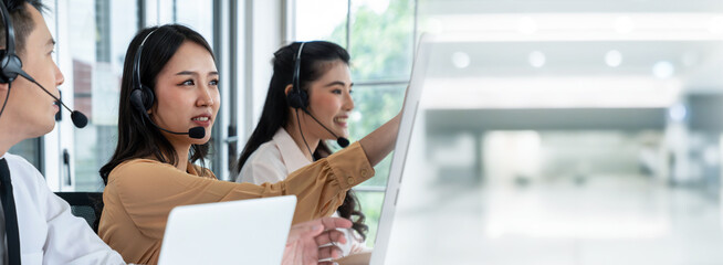 Business team wearing headset working actively in office . Call center, telemarketing, customer support agent provide service on telephone video conference call. - obrazy, fototapety, plakaty