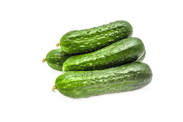 Ripe cucumber with pimples on a white background