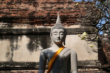 Bust statue of Buddha looks peaceful