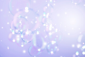 Beautiful Transparent Shiny Purple Soap Bubbles Background.