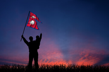 Father and son hold the flag of Nepal - obrazy, fototapety, plakaty