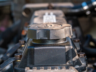 Filler cap for filling engine oil into a car engine. Engine oil filling point. Service service. Car...