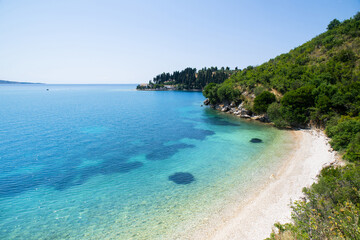 Beautiful beach in Corfu island, Greece, Mediterranean landscape and famous travel destination in Europe.
