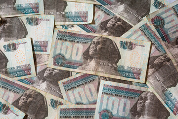 Pile of one hundred pound Egyptian banknotes