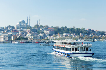 Touristic sightseeing ships in Golden Horn bay of Istanbul, Turkey.