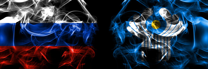 Russia, Russian vs Commonwealth flags. Smoke flag placed side by side isolated on black background