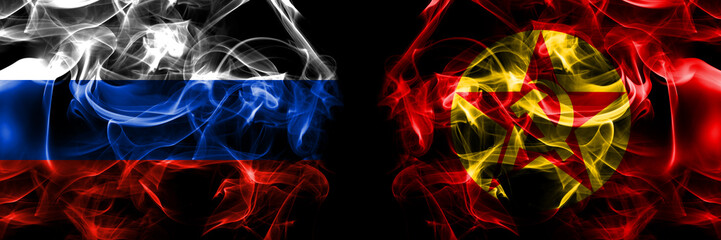 Russia, Russian vs DHKP, Turkey flags. Smoke flag placed side by side isolated on black background