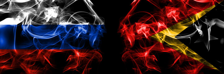 Russia, Russian vs East Timor, Timorese flags. Smoke flag placed side by side isolated on black background