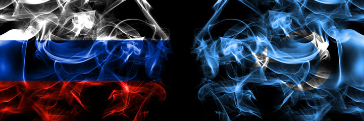 Russia, Russian vs East Turkestan, Uyghurs, Uyghur flags. Smoke flag placed side by side isolated on black background