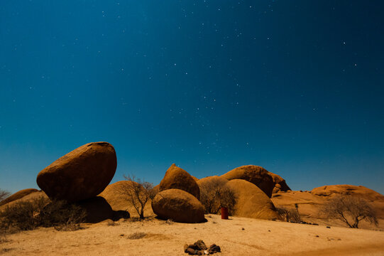 Night shot in the Namibian Desert showing the stars coming out.