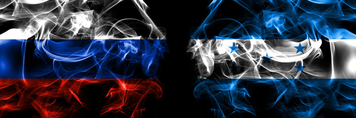 Russia, Russian vs Honduras, Honduran flags. Smoke flag placed side by side isolated on black background