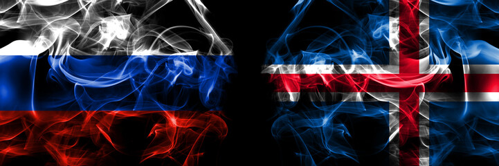 Russia, Russian vs Iceland, Icelandic flags. Smoke flag placed side by side isolated on black background